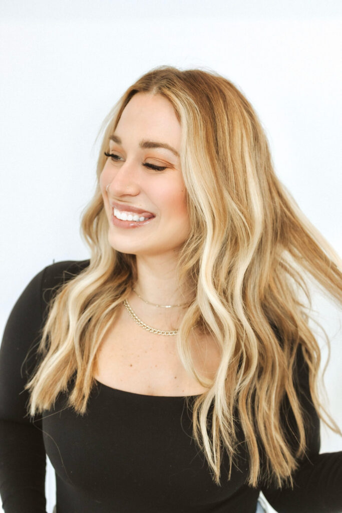  smiling blonde with bridal lash extensions
