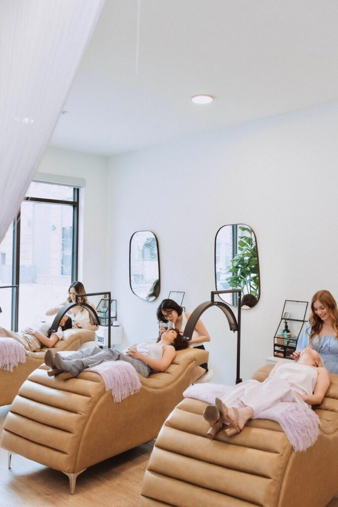 Modern and relaxing lash studio with comfortable beds and professional lash lamps